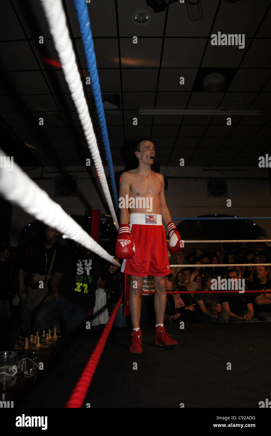 Chessboxing, boxing and chess board game being played alternately as part  of a new surreal sport, Islington, London, UK Stock Photo - Alamy