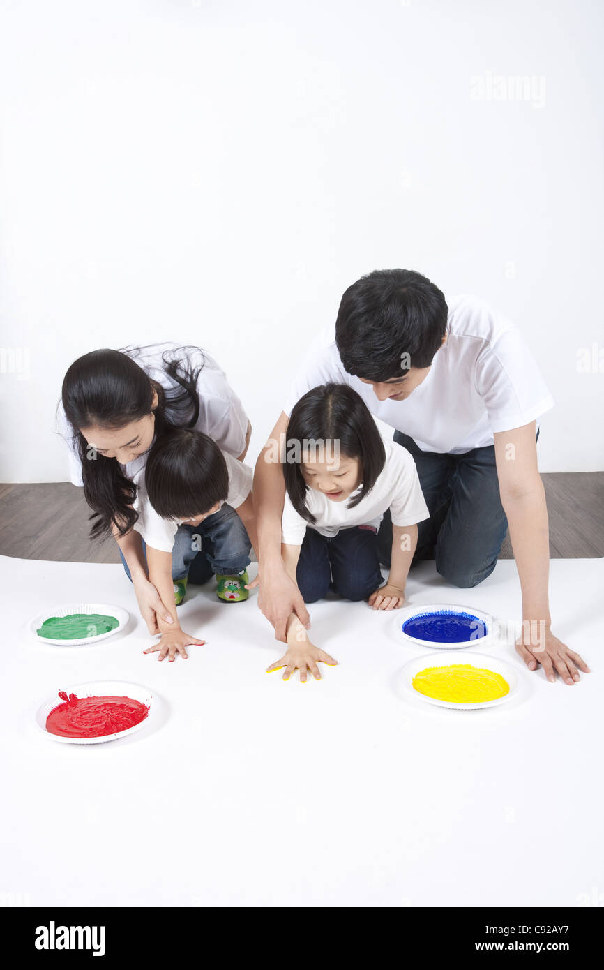 Two asian girls painting hi-res stock photography and images - Alamy