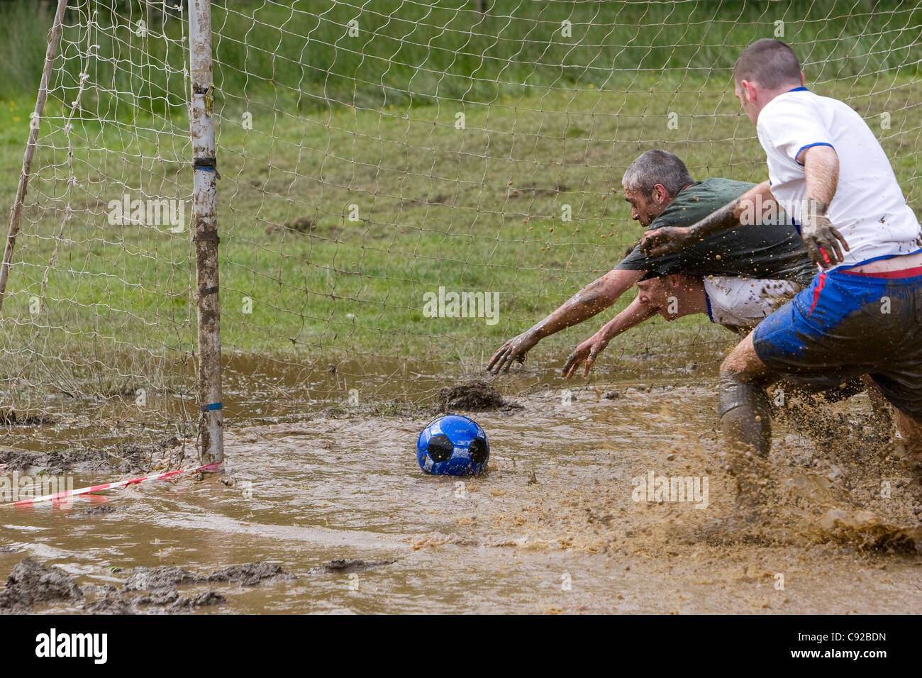 The quirky annual Swamp Soccer World Cup, held in Strachur, Argyll, Scotland Stock Photo