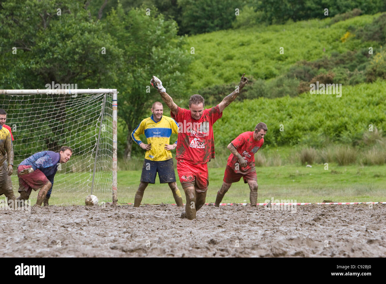 The quirky annual Swamp Soccer World Cup, held in Strachur, Argyll, Scotland Stock Photo