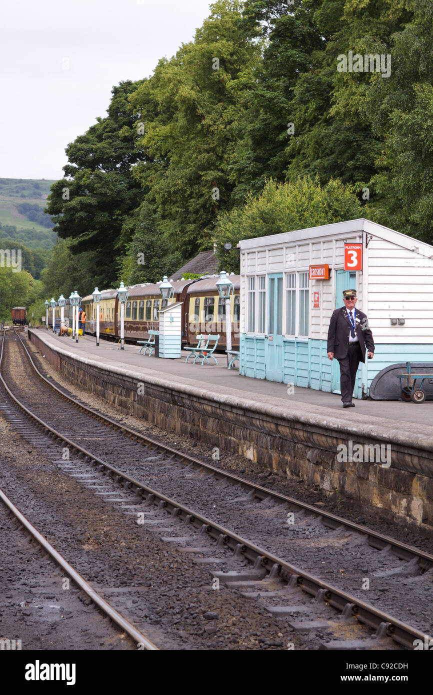 Station Master at Grosmont railway station in the Esk Valley originally operated by Northern Rail but closed in 1965 now Stock Photo