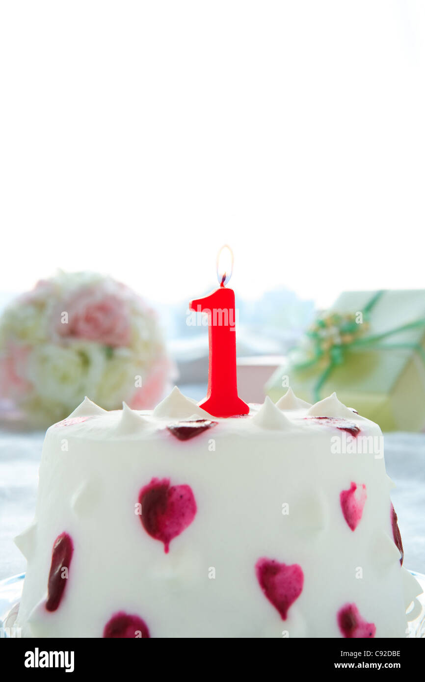 Birthday cake with a number 1 candle hi-res stock photography and