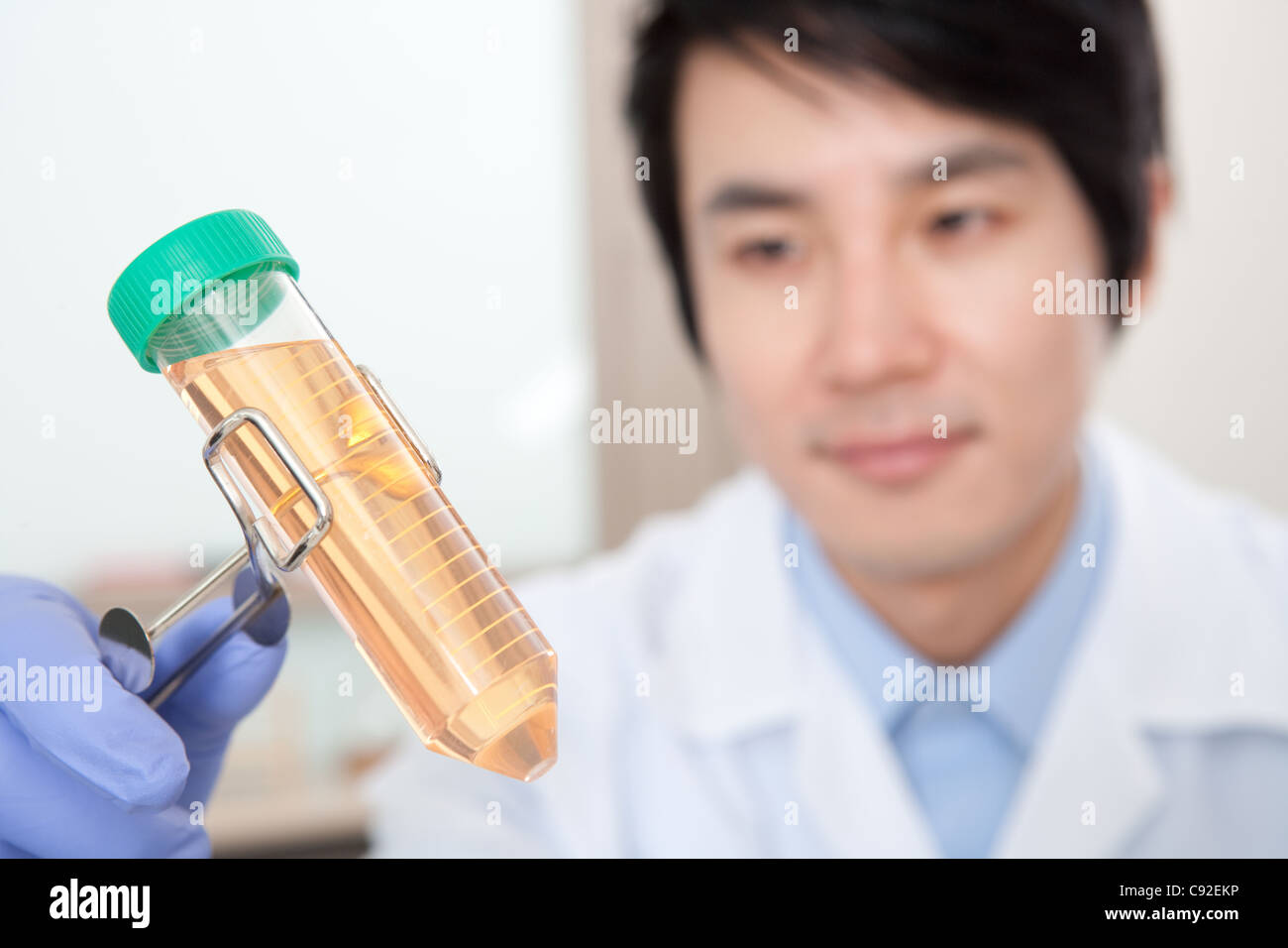 Scientist holding test tube Stock Photo Alamy