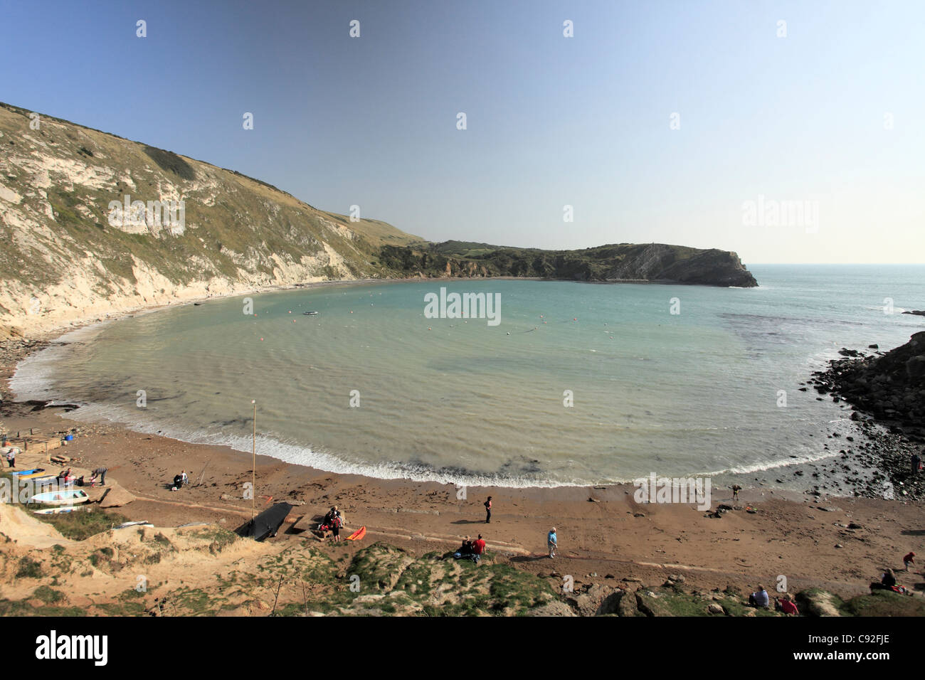 Lulworth cove is a natural horseshoe cove and beach on the Jurassic coast in Dorset. Stock Photo