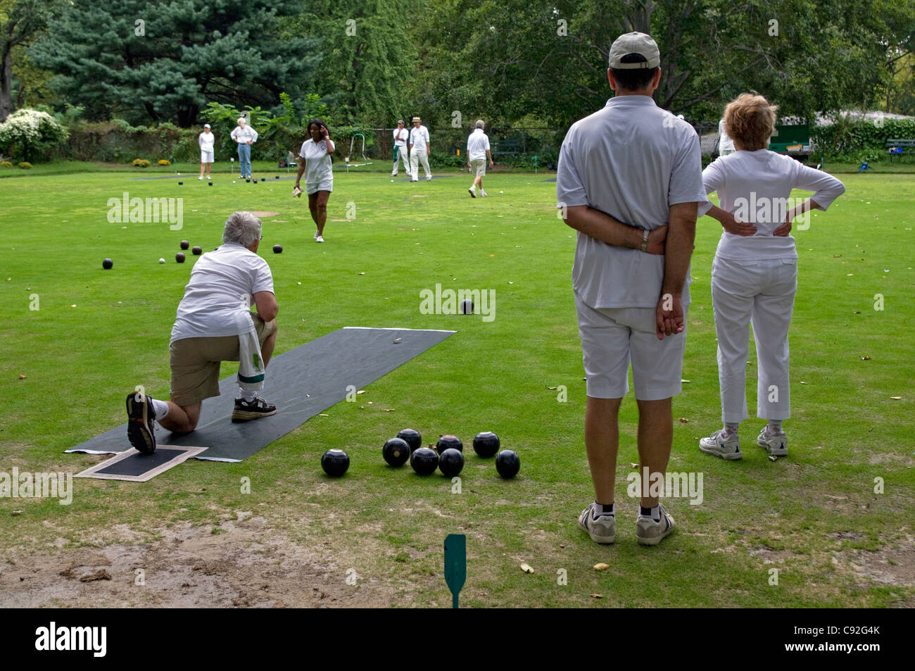 Lawn Bowling Club members compete in New York's Central Park, NYC, USA Stock Photo
