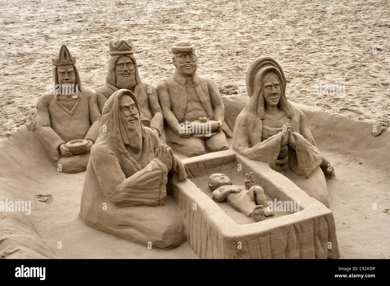 Sand sculpture of the nativity scene. Religious subject. Sand . Beach