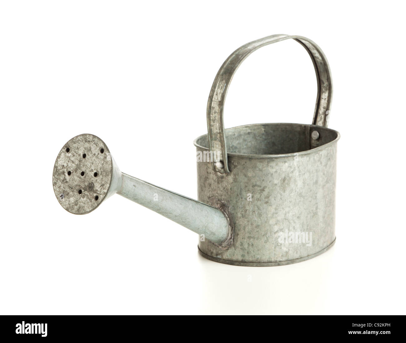 tin watering can on white background Stock Photo