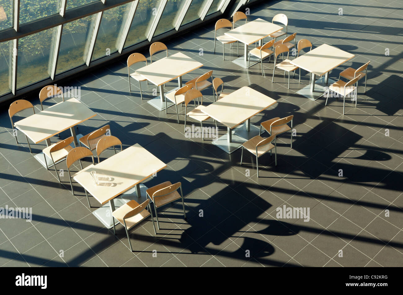 canteen tables in the sunlight Stock Photo