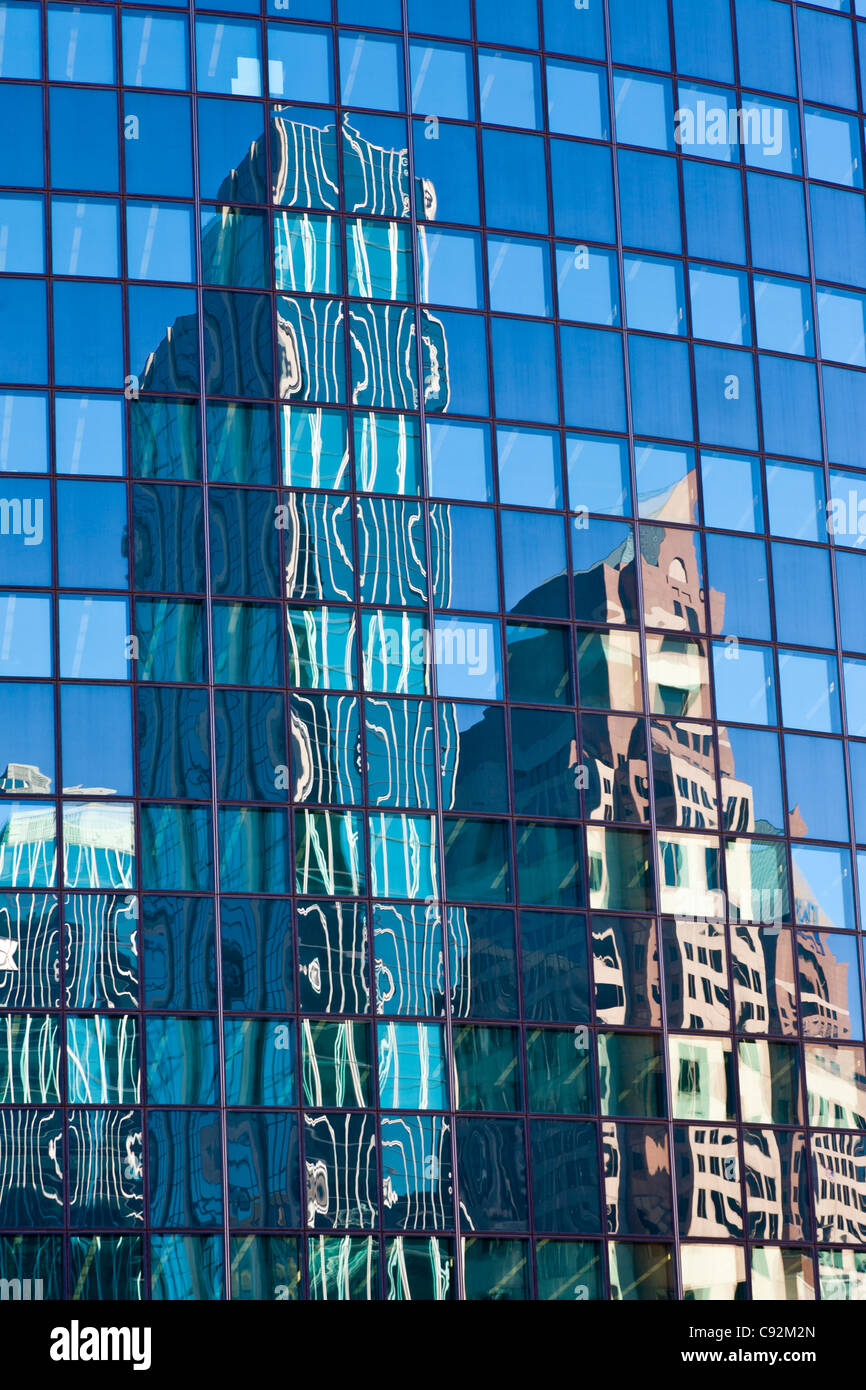 Reflections of buildings in glass windows of Phoenix Mutual Life Insurance Building in downtown Hartford Connecticut Stock Photo