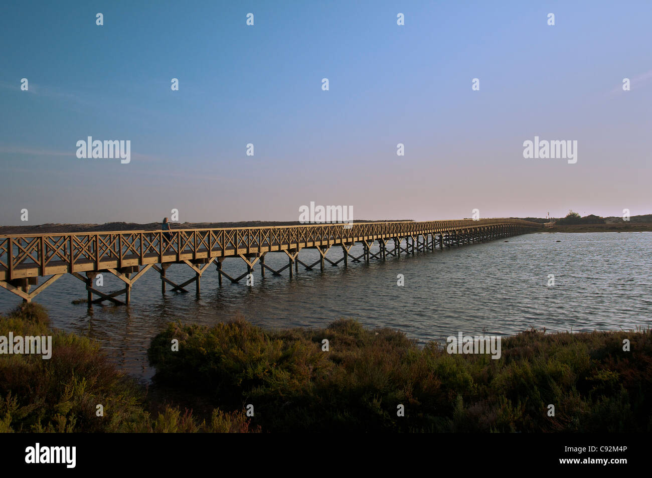 Wooden pedestrian bridge over Ria Formosa Lagoon Quinta do Lago Algarve