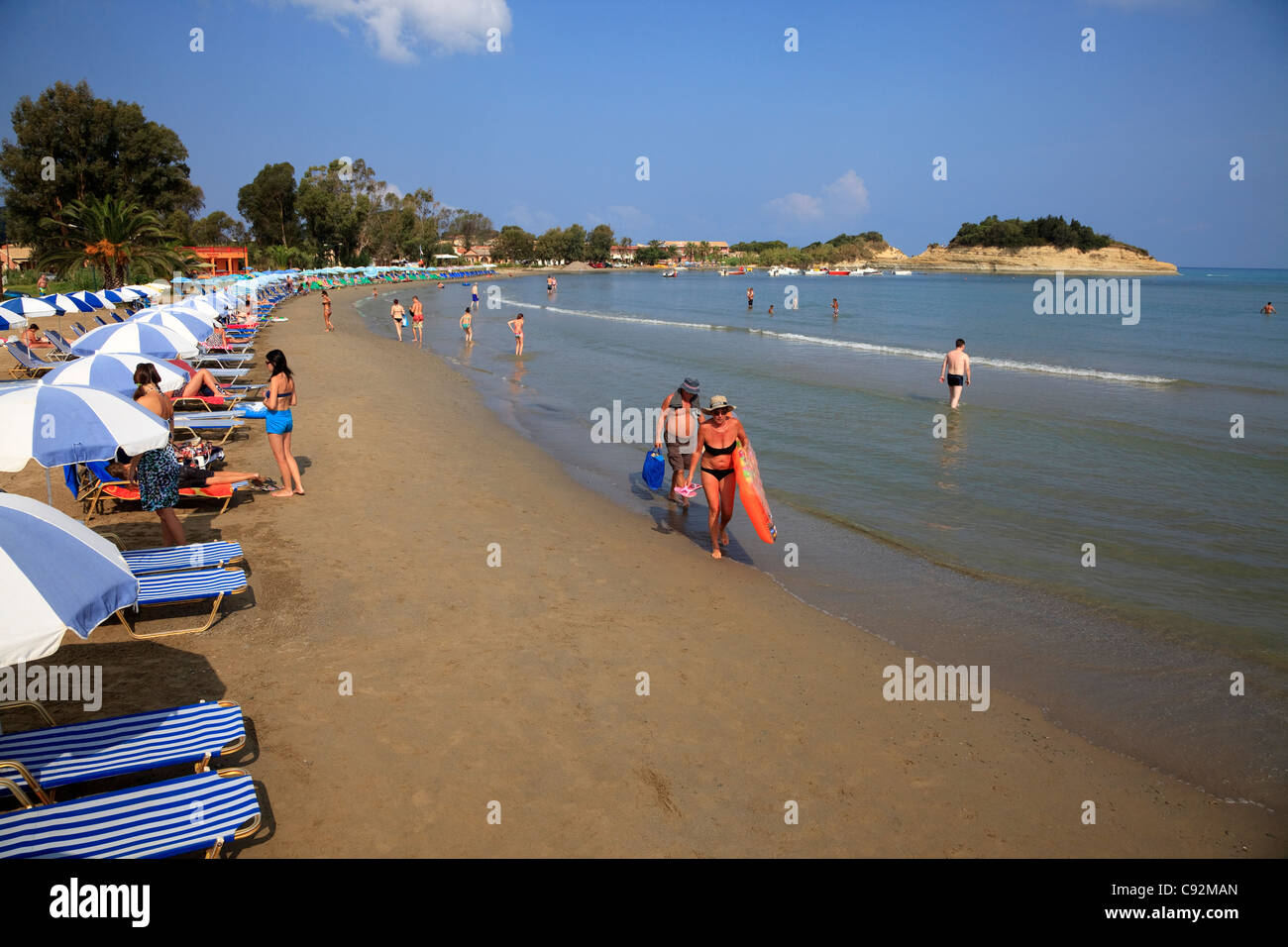 Sunbeds on Sidara beach, Corfu, Greece Stock Photo