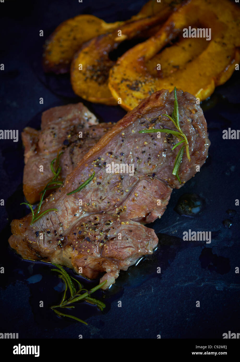 Cooked grilled leg of lamb steak Stock Photo Alamy