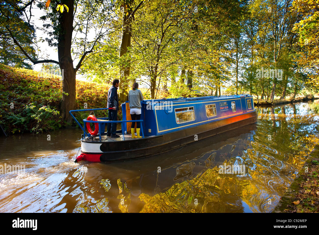 Narrow boat on the Llangollen Canal at Ellesmere, Shropshire UK in autumn Stock Photo