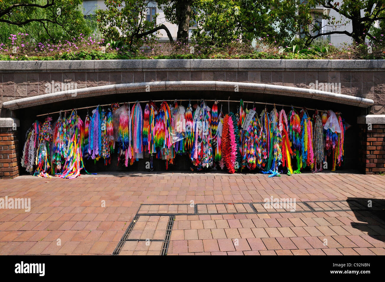 Paper cranes representing peace at Nagasaki Peace Park established in 1955 near the hypocentre of the 1945 World War Two atomic Stock Photo
