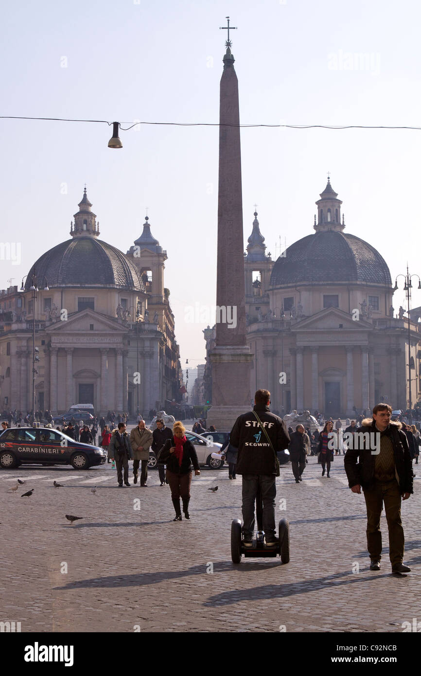 Piazza del Popolo (People's Square) with the 'twin' churches of of Santa Maria in Montesanto on the left (1662-75) and Santa Stock Photo