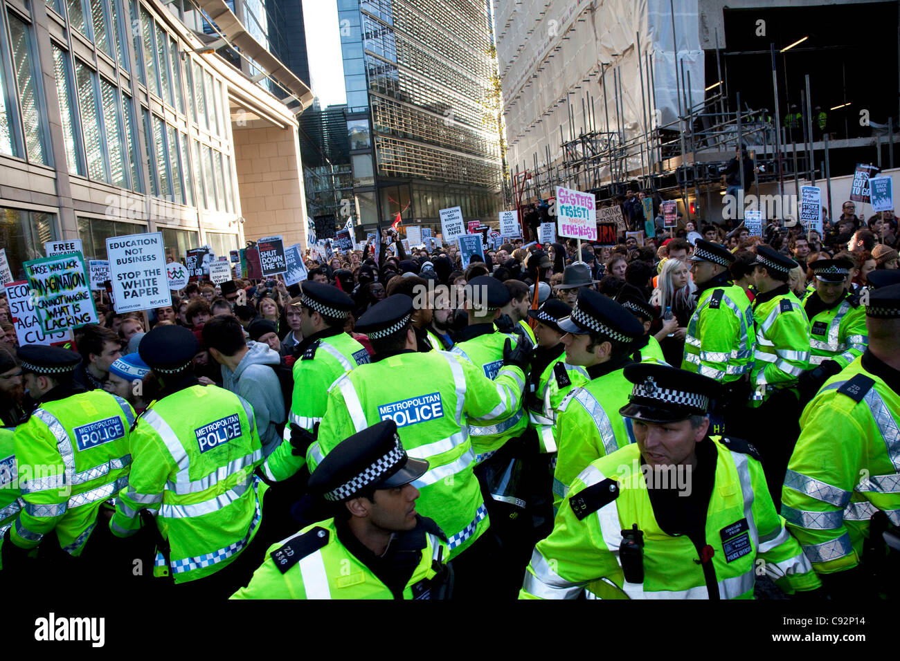 Police lead student march through central London to protest against ...