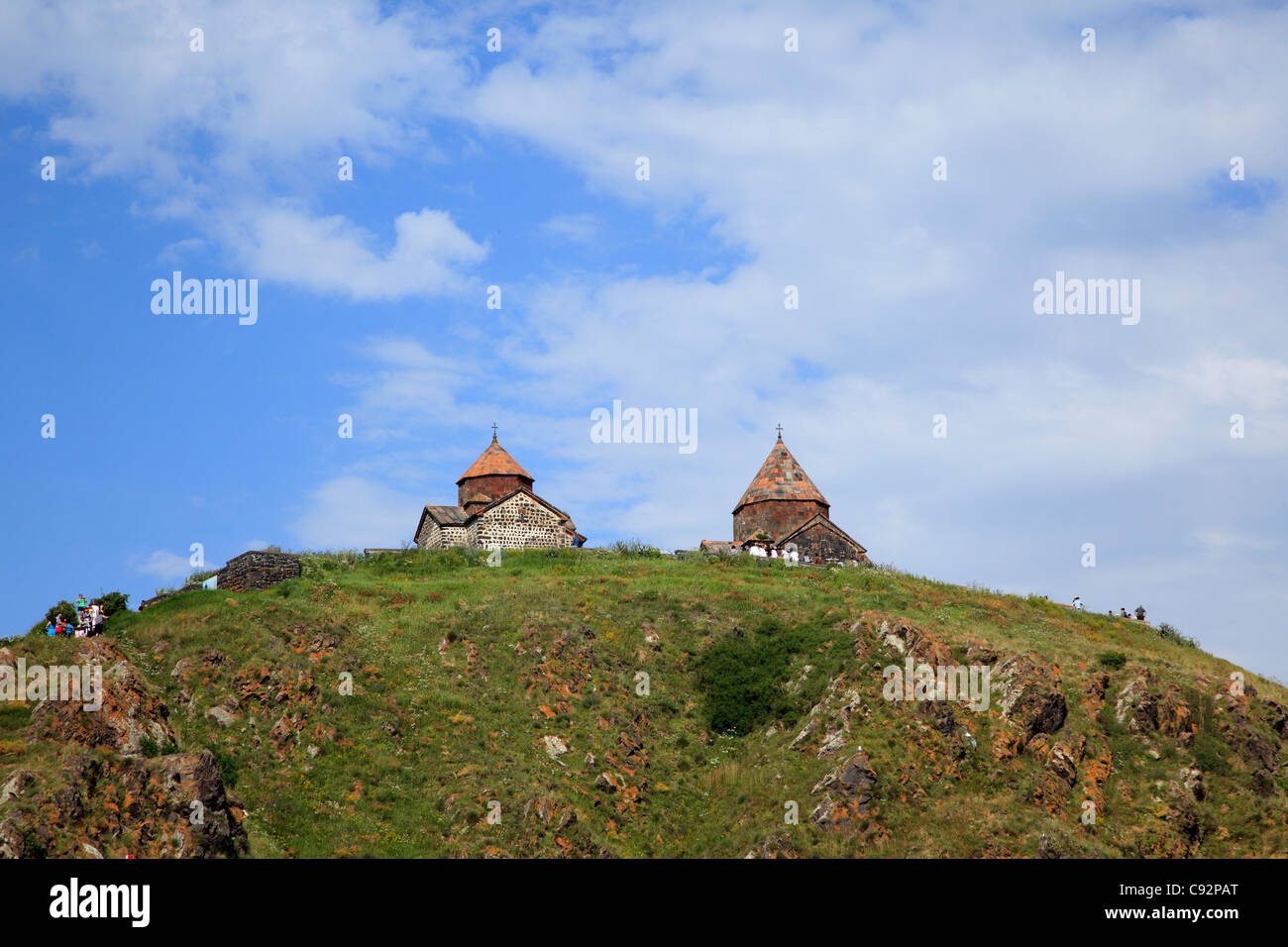 There is a large monastery on the island in Lake Sevan, founded in the 9th century, and the buildings overlook the lake. Stock Photo