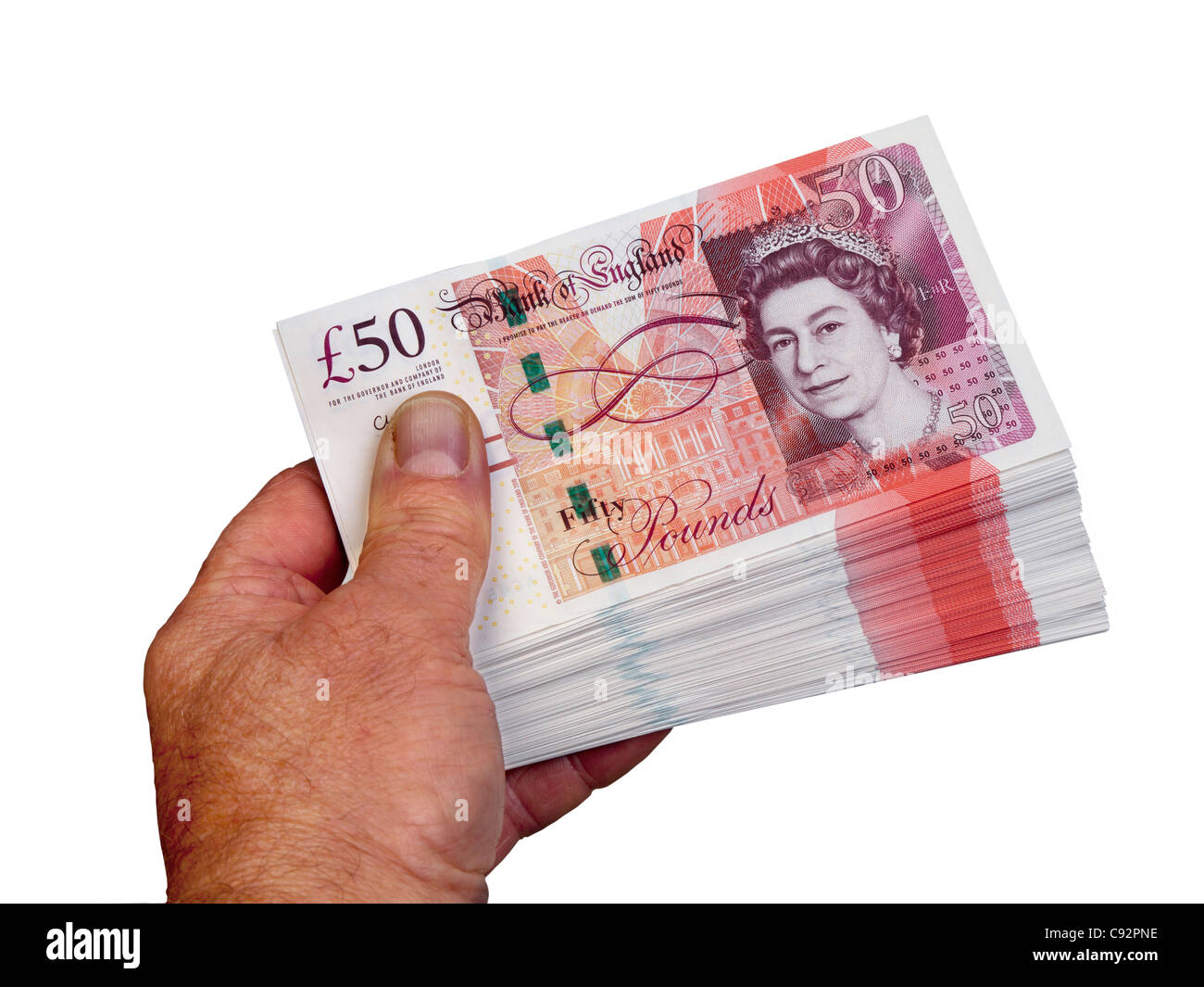 50 pound British currency bank notes £50 cash held in male hand Stock Photo