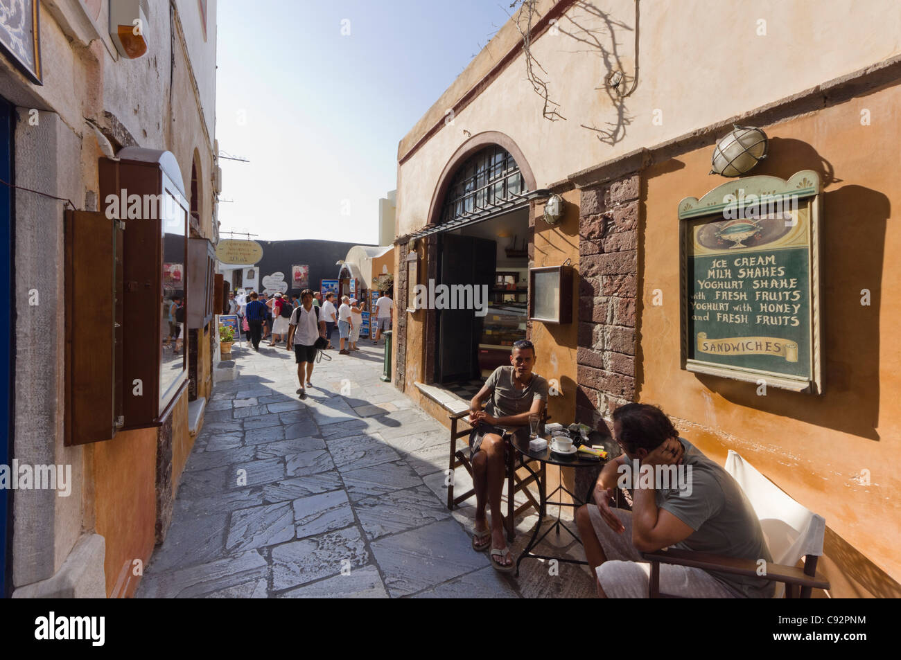 Santorini - Oia village. Street with café. Stock Photo