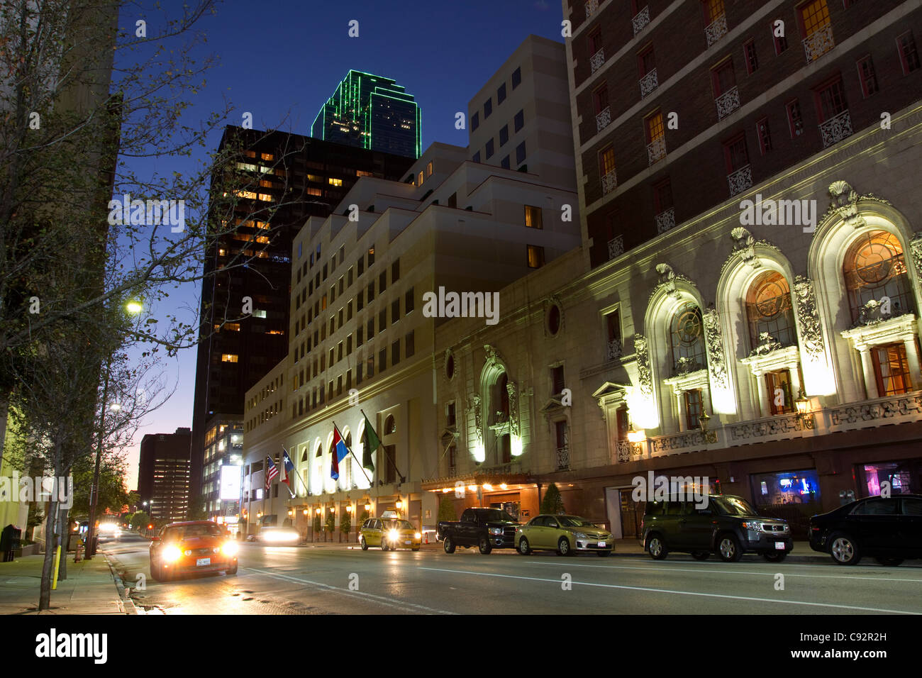 Night Street Scene Busch Kirby Building with Bank of America in Background, Main Street Dallas Texas Stock Photo