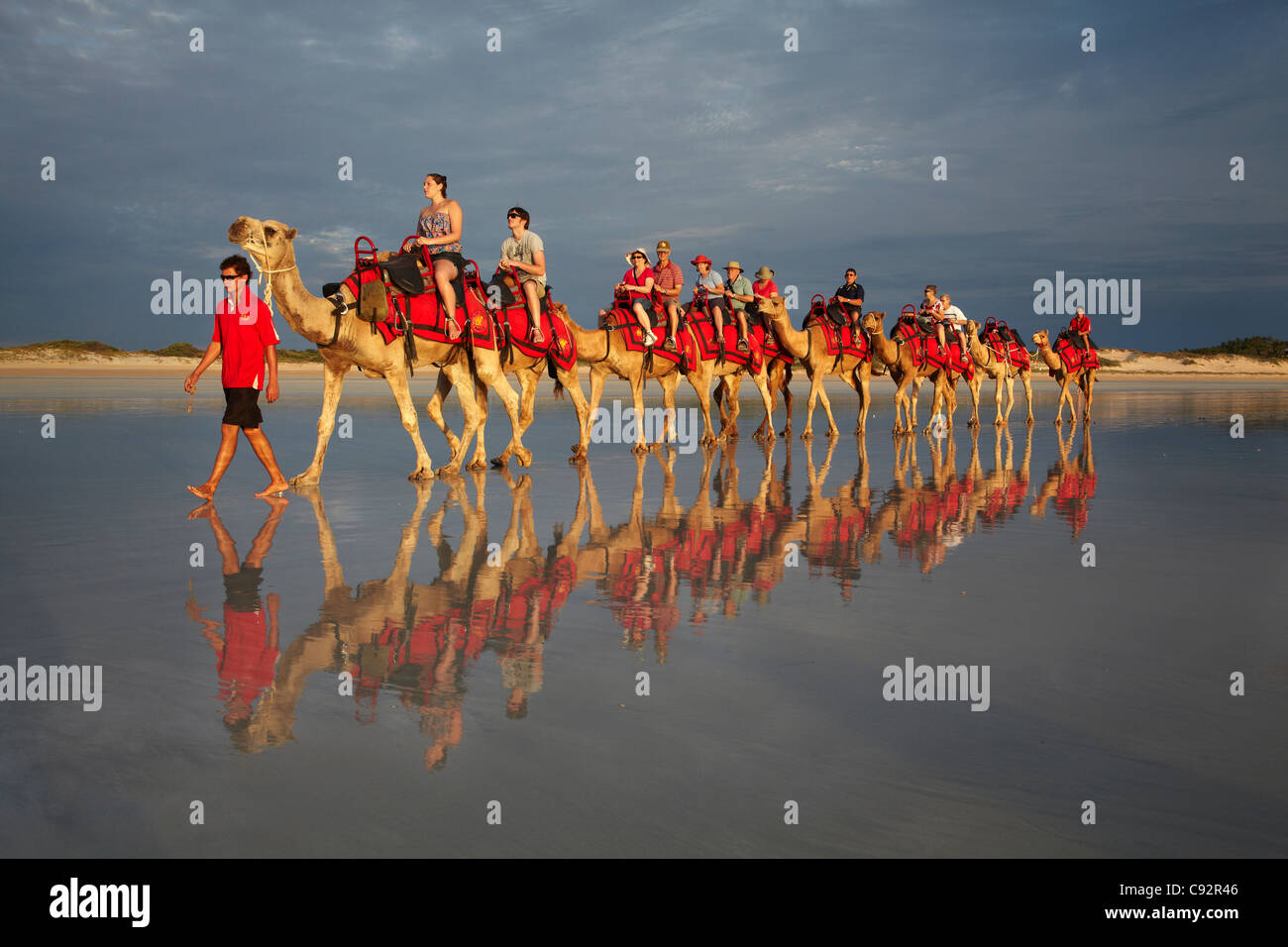 Tourist camel train on Cable Beach, Broome, Kimberley Region, Western Australia, Australia Stock Photo