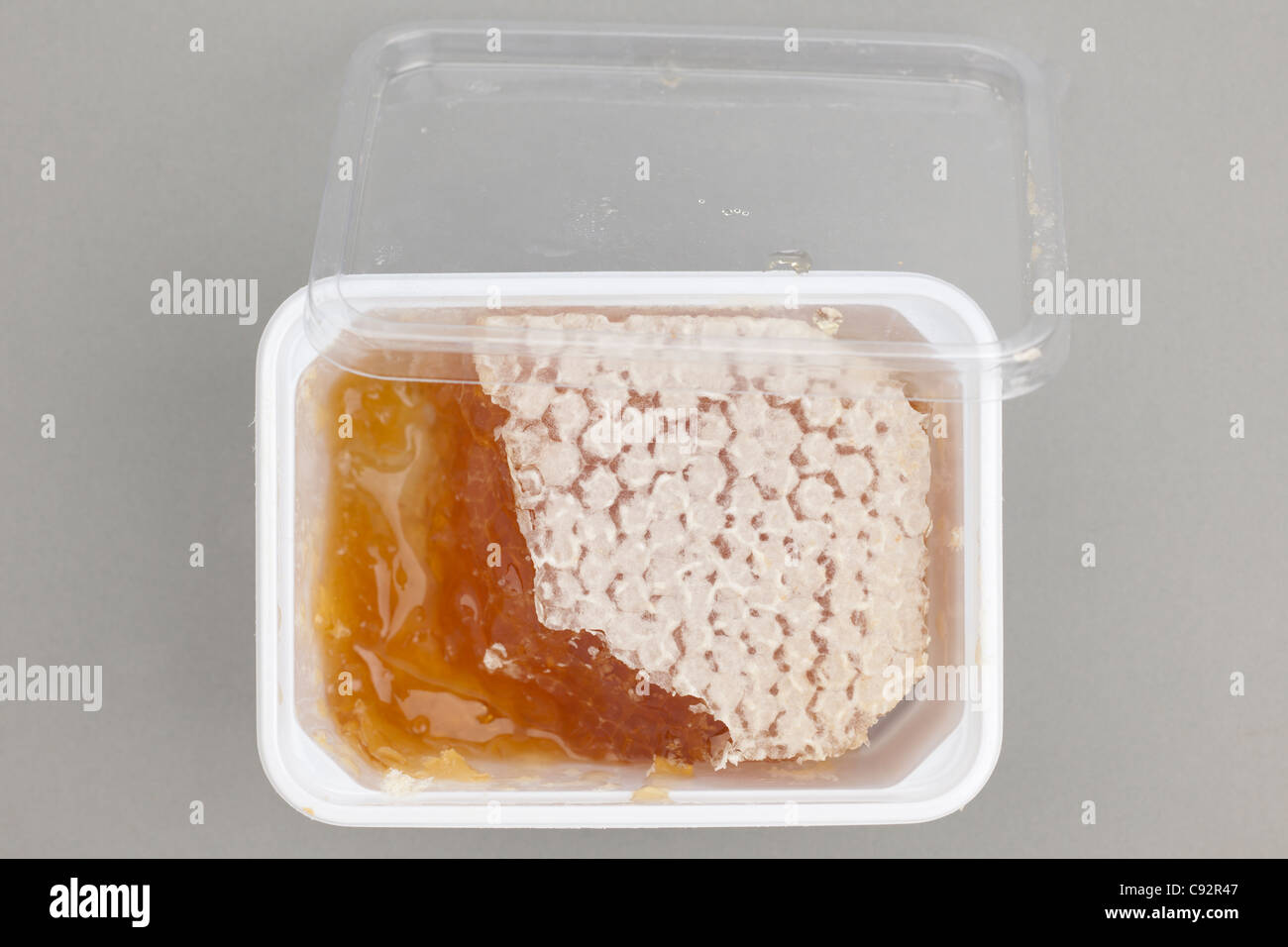 Tub of Comb honey Stock Photo