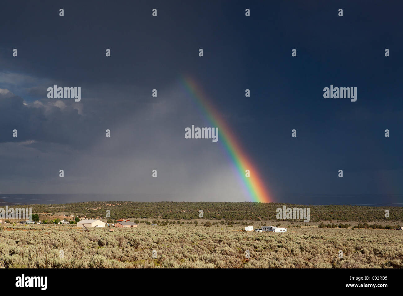 The rainbow before big storm in Arizona desert Stock Photo - Alamy