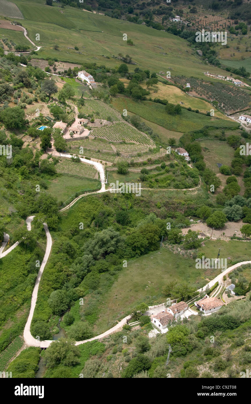 Farmhouses and farmland in valley, Ronda, Málaga Province, Andalusia, Spain, Europe Stock Photo
