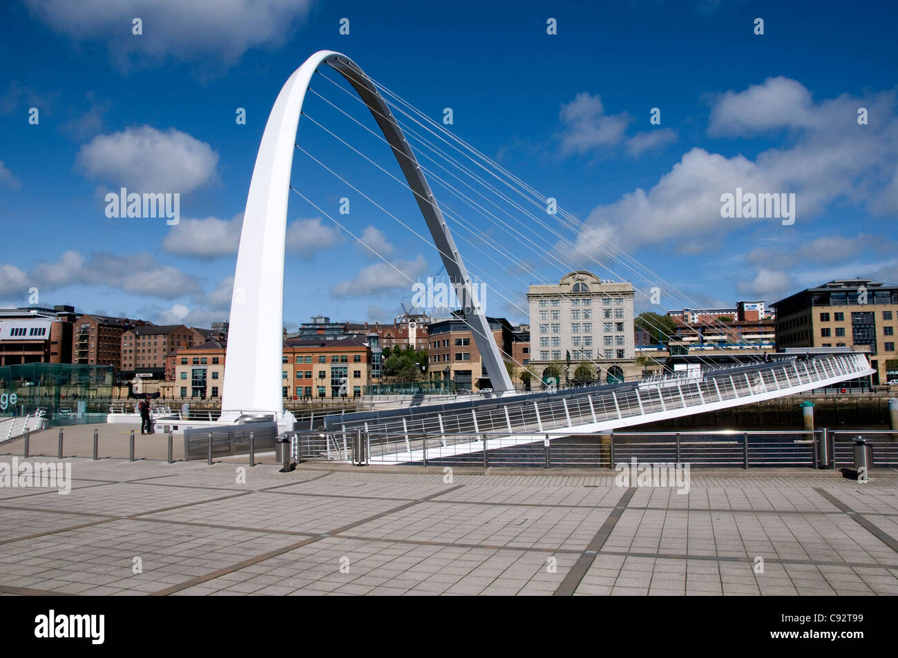 Gateshead Millennium Bridge is a modern bridge over the River Tyne and a newly regenerated area of the city. Stock Photo