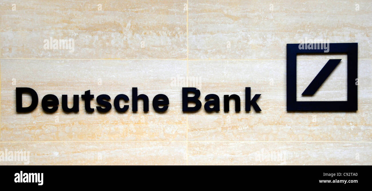 Deutsche Bank sign & logo on office building wall in the financial district square mile of the City of London England UK Stock Photo
