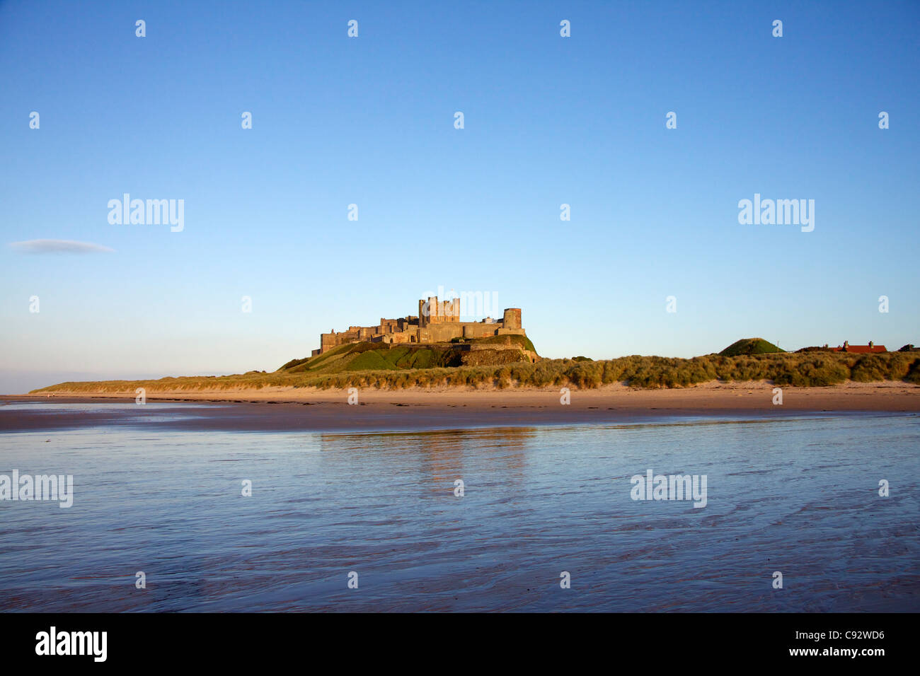 Bamburgh Castle is one of the largest inhabited castles in the UK built on a basalt outcrop. Northumberland, England. Stock Photo