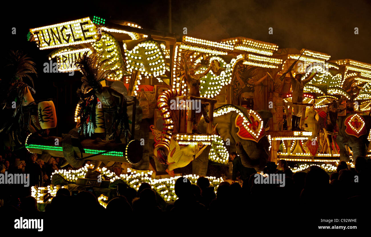 floats lit up at night with music playing during the bridgwater