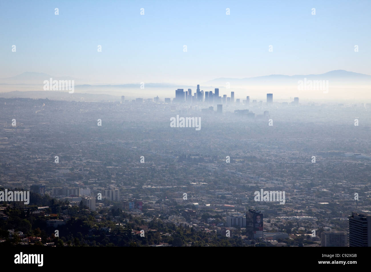 There is frequently very poor air quality over Los Angeles city with a haze or pollution cloud covering the area. Stock Photo