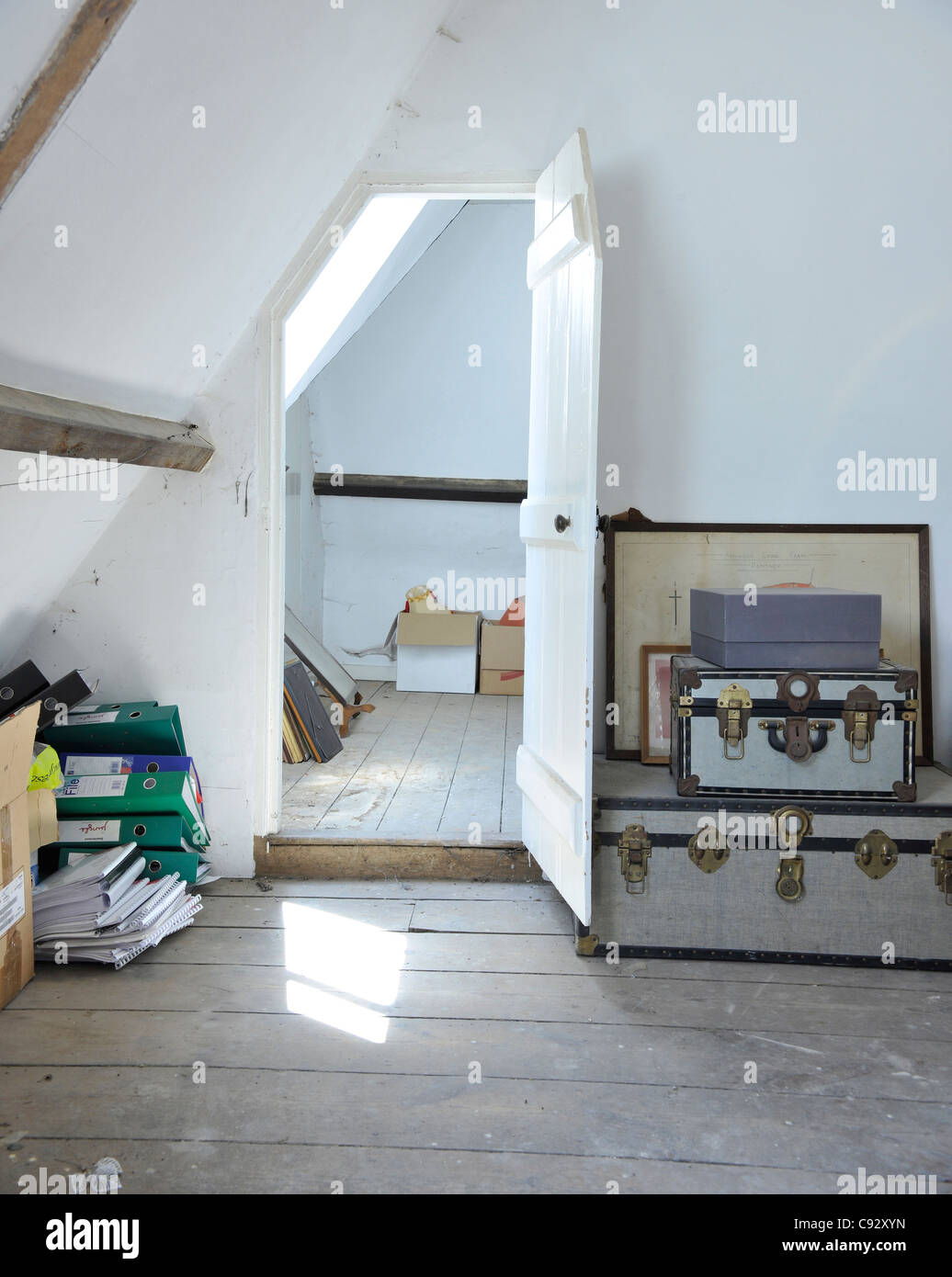 Attics are traditionally used in British homes to store articles and posessions that families no longer have requirement for Stock Photo