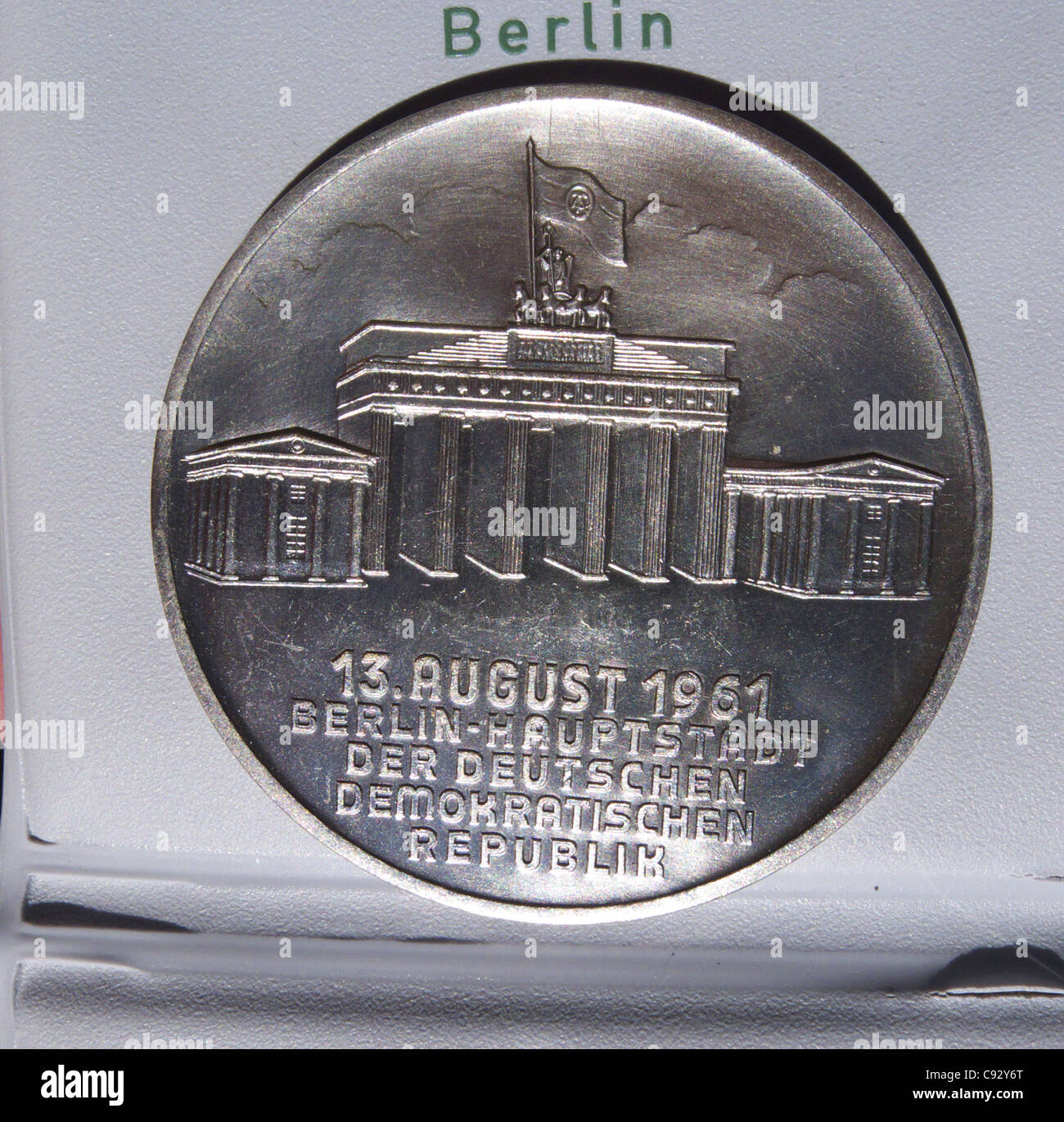 An East German medallion given to construction workers who helped put up the Berlin Wall overnight on the 13th august 1961 Stock Photo
