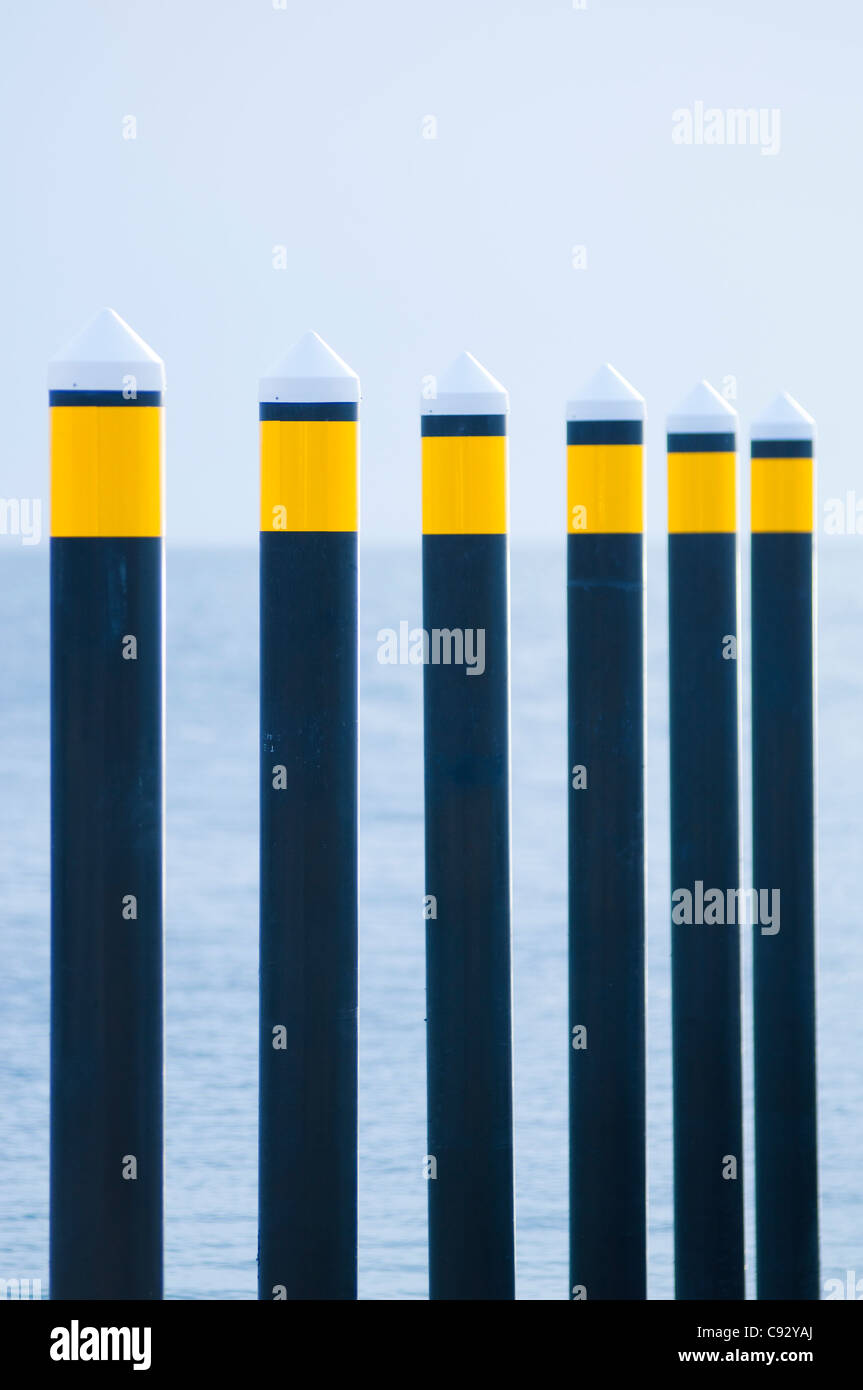 Guide pylons for docking ships Stock Photo