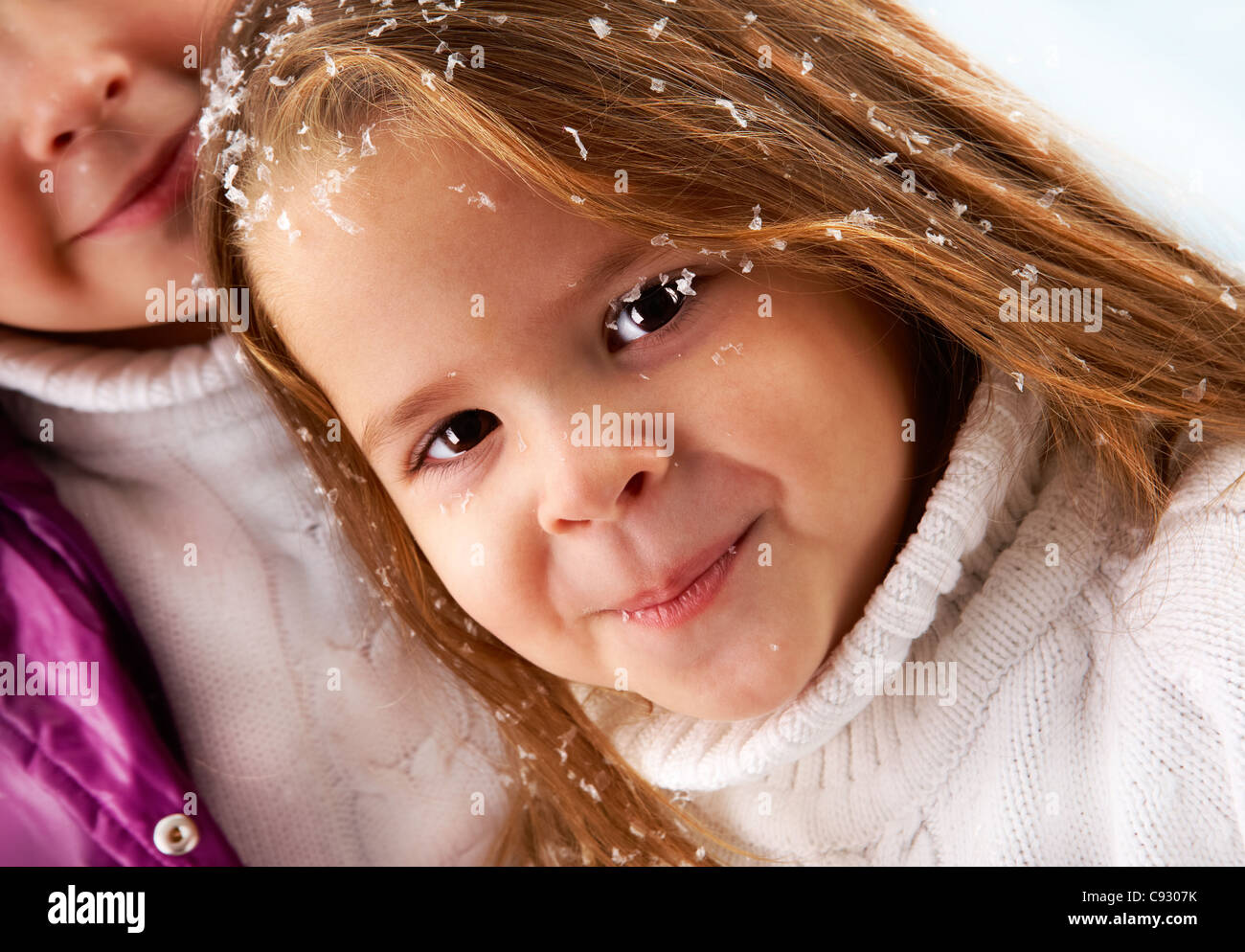 Happy girl looking at camera with smile Stock Photo - Alamy