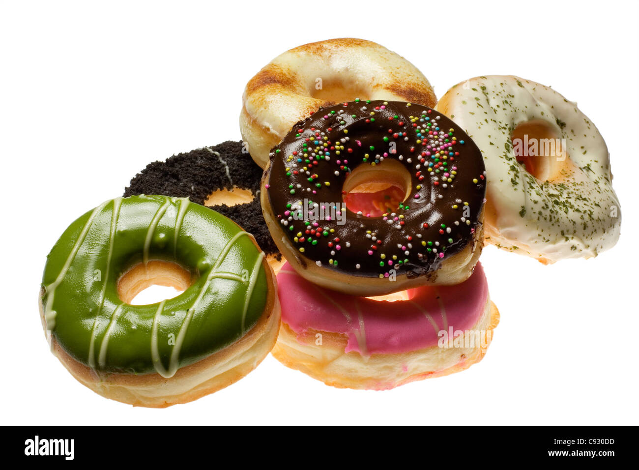 Pile of donuts isolated on white background Stock Photo - Alamy