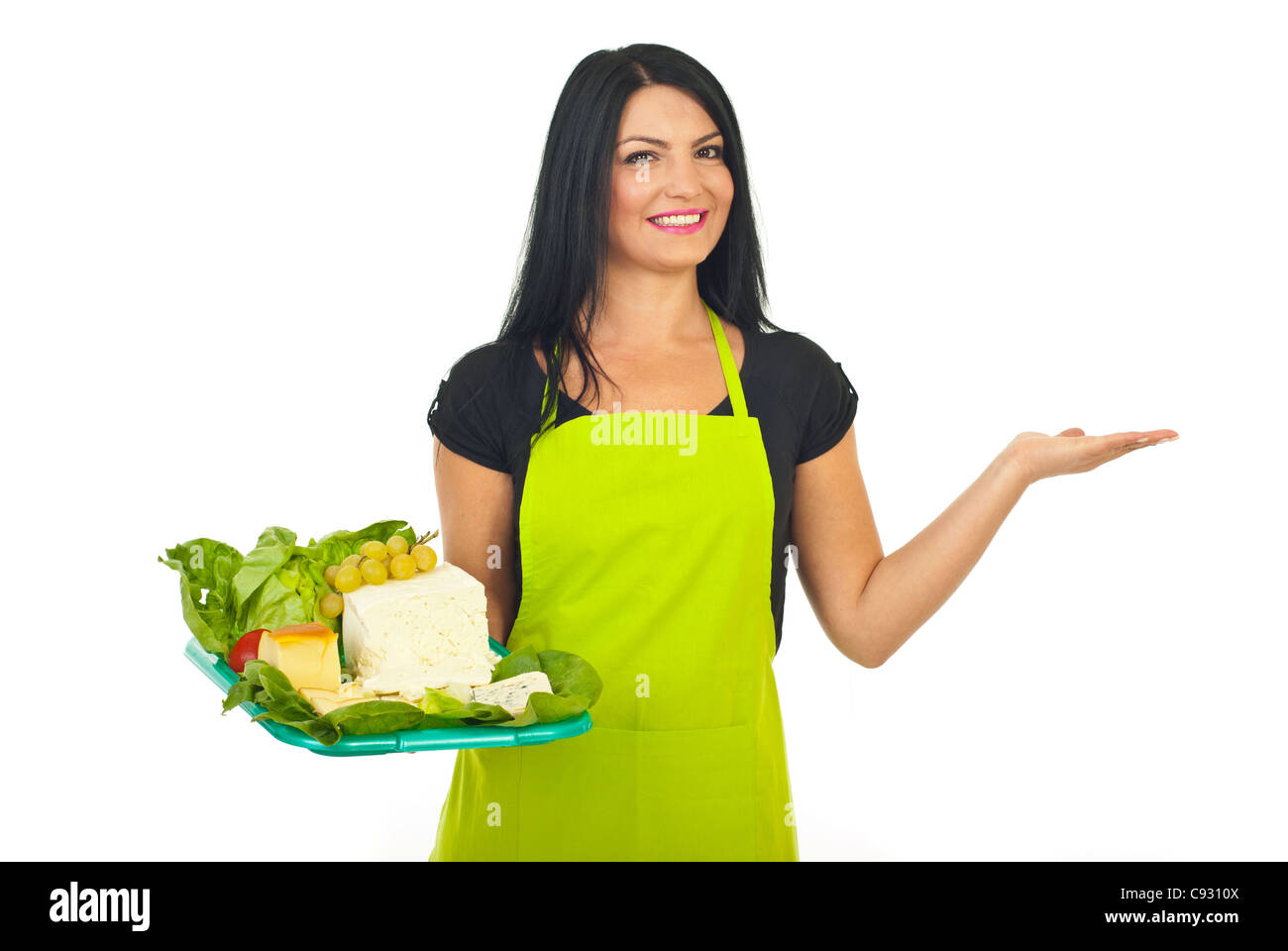 Beauty cheese maker woman holding plateau with different cheeses and making presentation to right part of image isolated Stock Photo