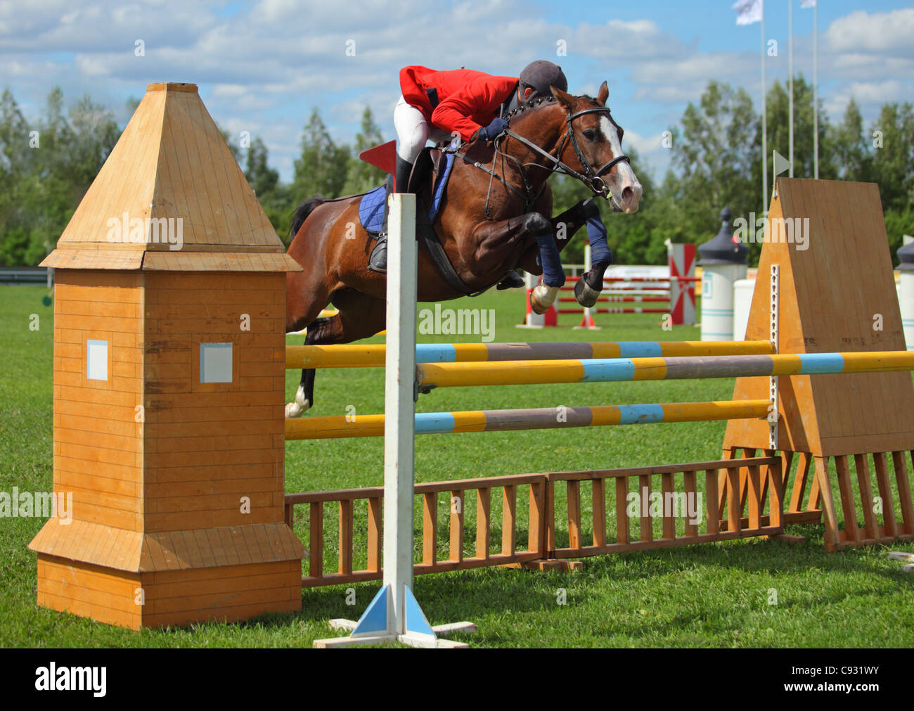 Equestrian sport. Show jumping competition. Concour hoppique Stock Photo