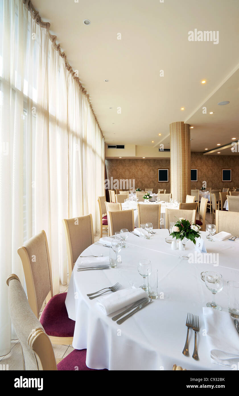 Interior of a restaurant prepared for wedding ceremony Stock Photo - Alamy