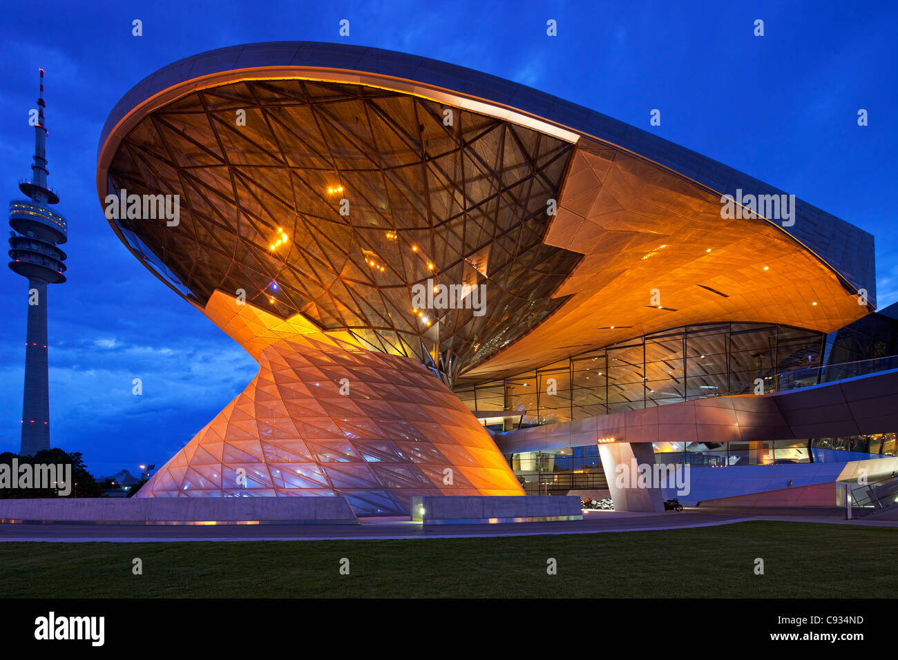 Twilight view of the main entrance to BMW Welt, a exhibition facility of the BMW Company,Munich, Bavaria, Germany Stock Photo