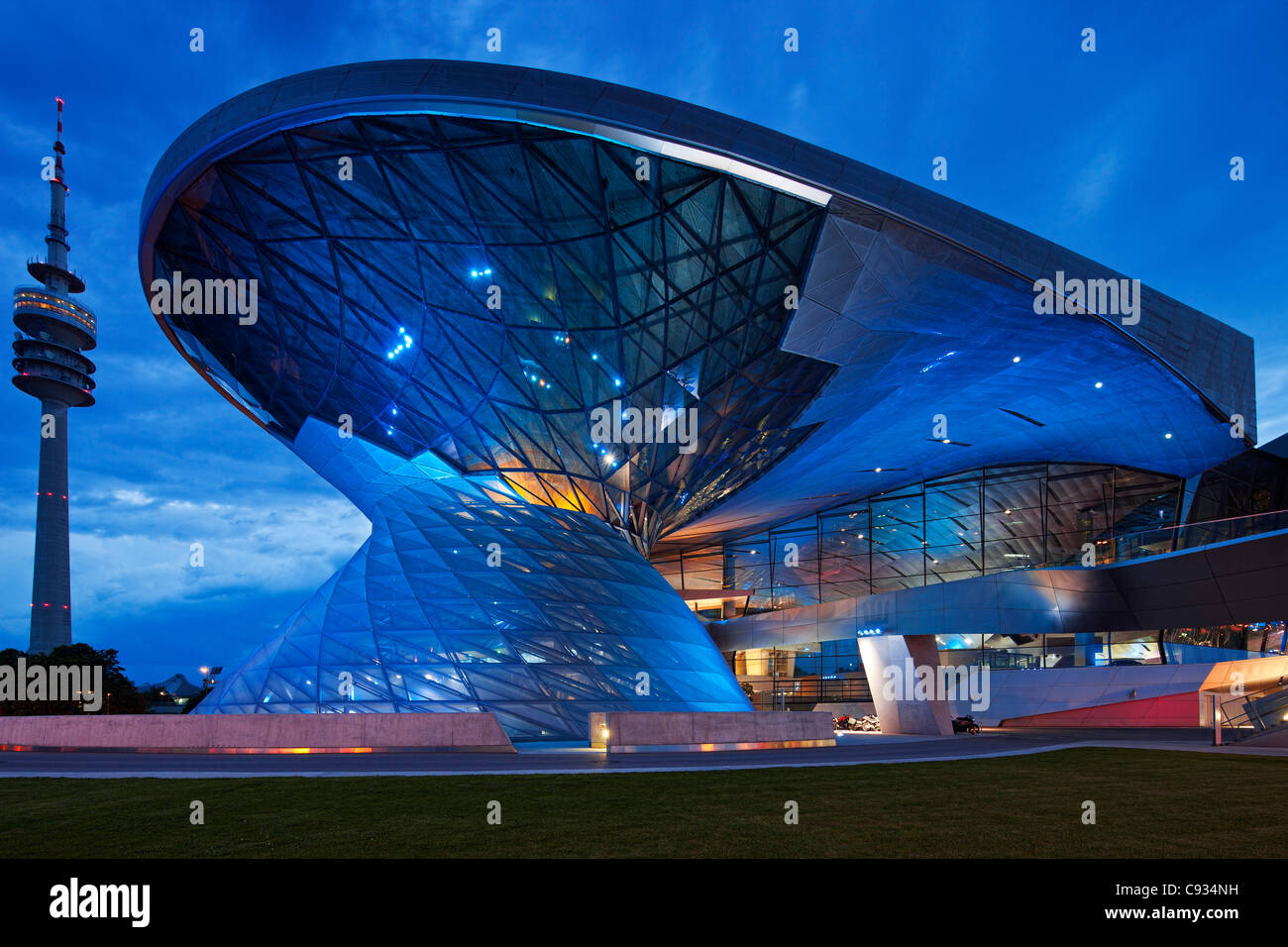 Twilight view of the main entrance to BMW Welt, a exhibition facility of the BMW Company,Munich, Bavaria, Germany Stock Photo