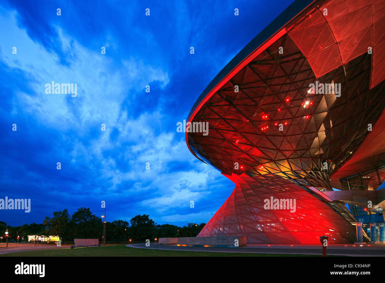 Twilight view of the main entrance to BMW Welt, a exhibition facility of the BMW Company,Munich, Bavaria, Germany Stock Photo