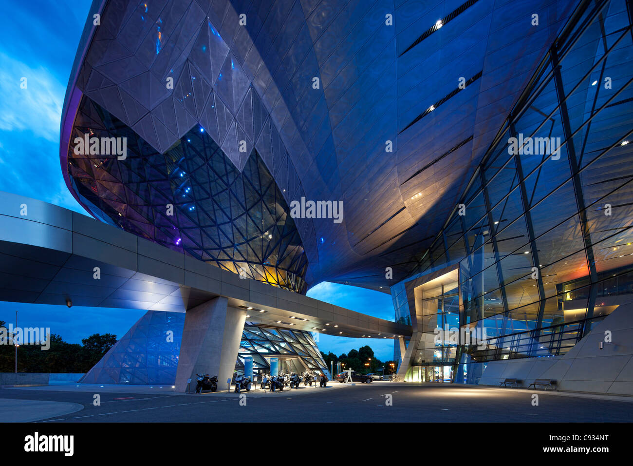 Twilight view of the main entrance to BMW Welt, a exhibition facility of the BMW Company,Munich, Bavaria, Germany Stock Photo