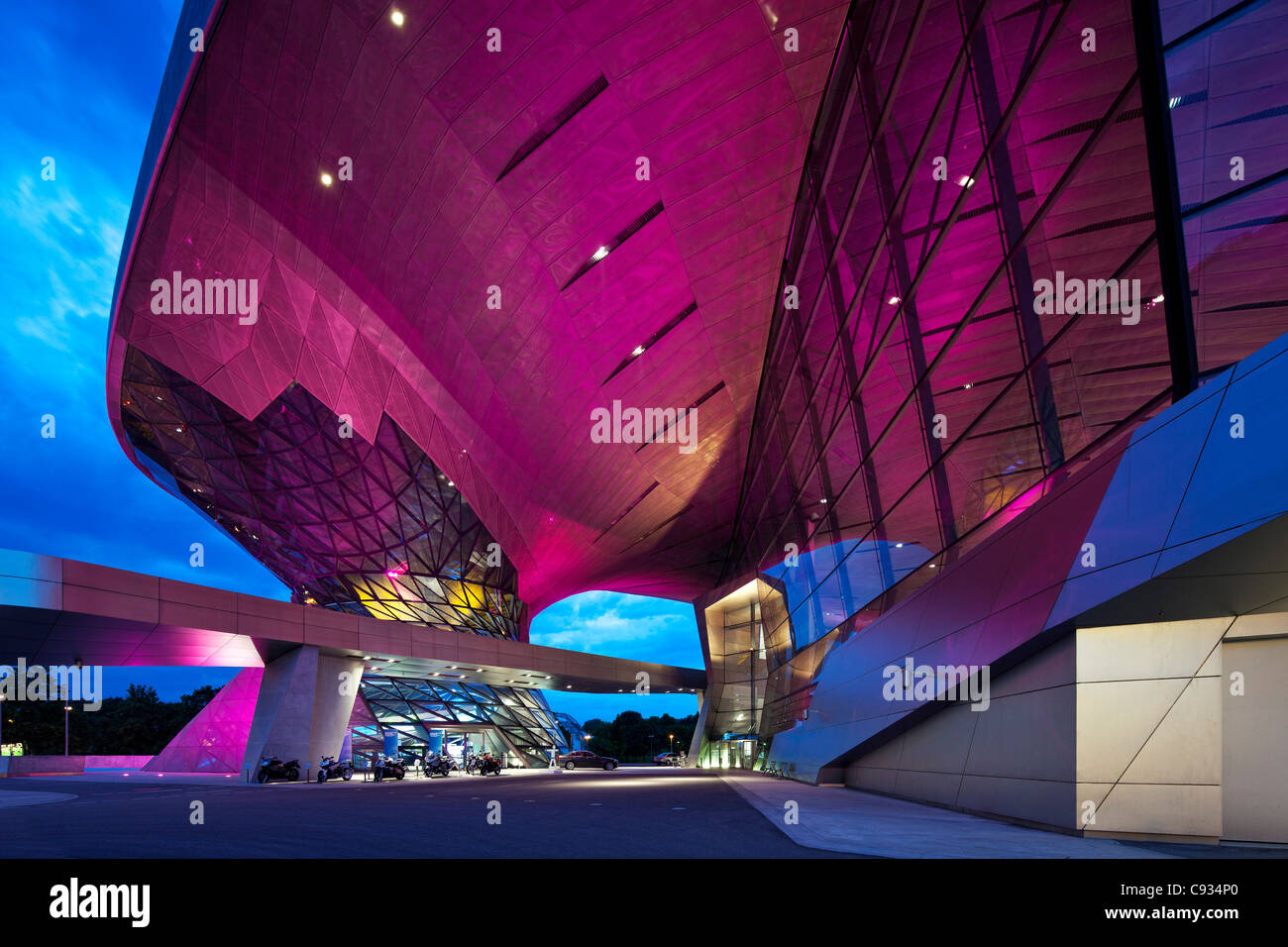 Twilight view of the main entrance to BMW Welt, a exhibition facility of the BMW Company,Munich, Bavaria, Germany Stock Photo