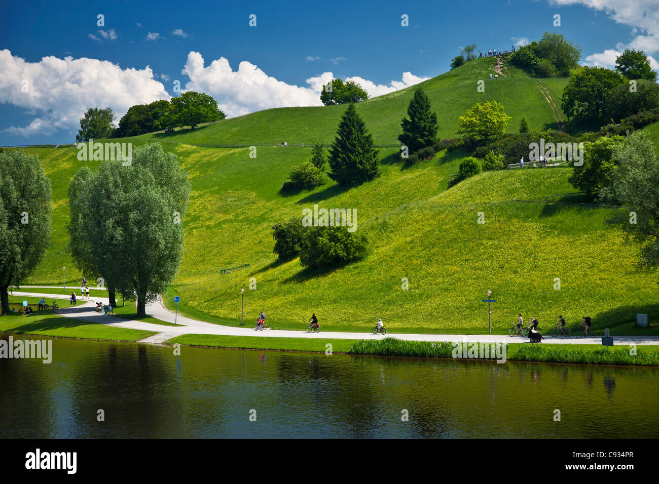 General view of the Munich Olympic Park looking across the lake towards the viewing platform, Gern, Munich, Bayern, Germany. Stock Photo