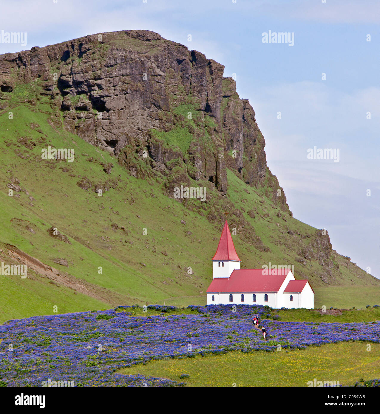 The church at Vik.  The town lies directly beneath the Myrdalsjokull glacier, which is itself on top of Katla Volcano. Stock Photo