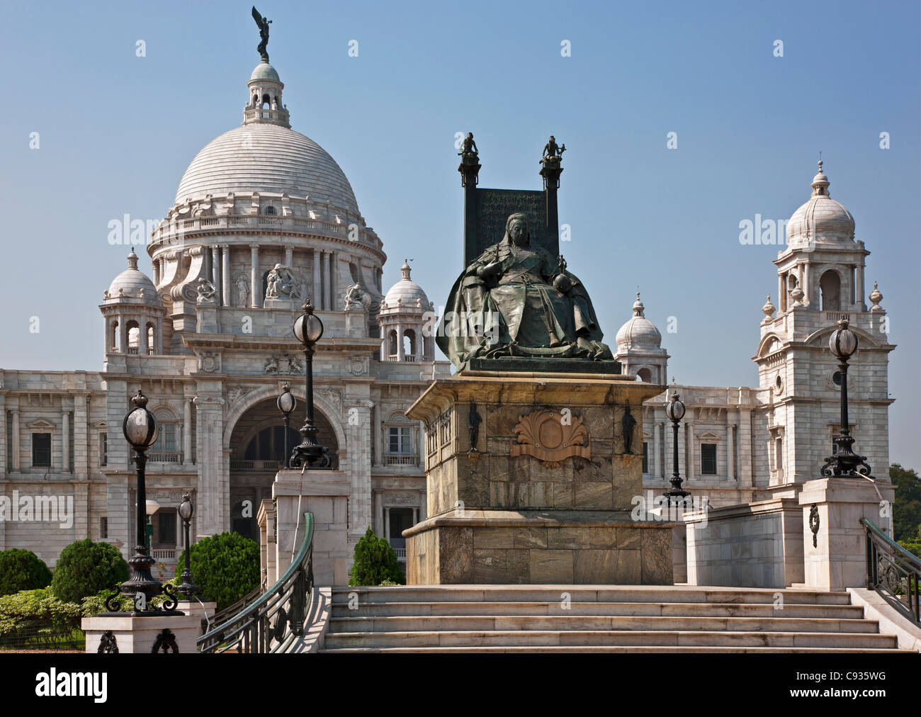 Situated in a well-tended park, the magnificent Victoria Memorial building with its white marble domes. Stock Photo