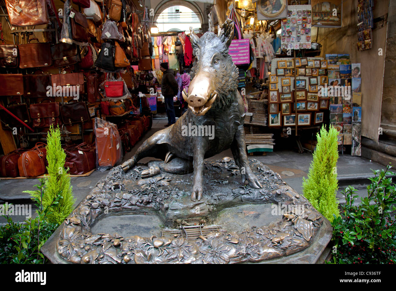 Italy, Florence, Tuscany, Western Europe; A monument to a wild boar standing in front of the market Stock Photo